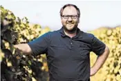  ?? BOB MCCLENAHAN ?? Larkmead Vineyards winemaker Dan Petroski is researchin­g which grapes will be suited to Napa’s future climate.