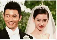  ?? — AP ?? Happy together: Angelababy with Huang on their wedding day in 2015.