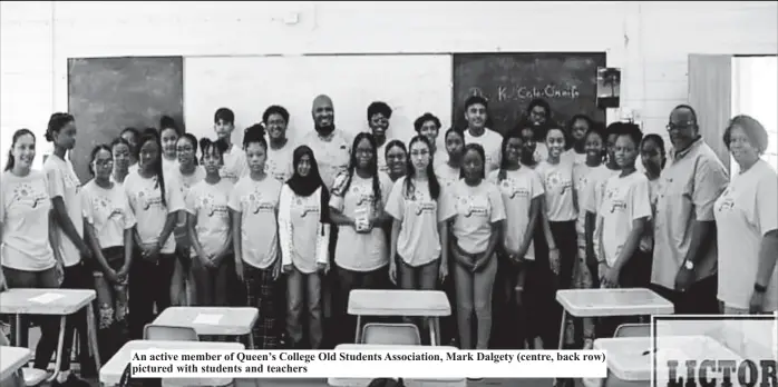  ?? ?? An active member of Queen’s College Old Students Associatio­n, Mark Dalgety (centre, back row) pictured with students and teachers