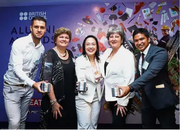  ??  ?? Treadell (second from right) and Deverall (second left) posing with the Malaysian award winners.