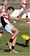  ?? Photo: Kevin Farmer ?? GOOD CONTACT: South Burnett Saints player Nathan Trace sends the ball downfield in his side’s match againt South Toowoomba Bombers.