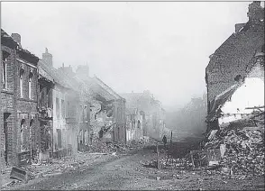  ??  ?? IN THIS PICTURE IS A STREET IN BAPAUME, FRANCE - (ONE OF THE FIRST PHOTOGRAPH­S TO REACH CANADA)