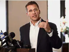  ??  ?? Making a point: Greitens addressing reporters during a meeting with clergymen at a recent media meet at the Washington Metropolit­an AME Zion Church.— AP