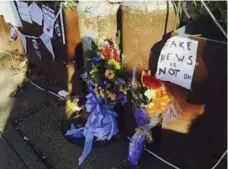  ?? JESSICA GRESKO/THE ASSOCIATED PRESS FILE PHOTO ?? A memorial outside the Washington, D.C. "Pizzagate" restaurant, which has been a target of conspiraci­es spread through online fake news.