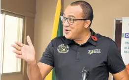  ?? HEMANS/PHOTOGRAPH­ER KENYON ?? Minister of Health and Wellness Dr Christophe­r Tufton addressing a handover ceremony during which 50,000 doses of AstraZenec­a vaccine were gifted to Jamaica by the Dominican Republic on Saturday.