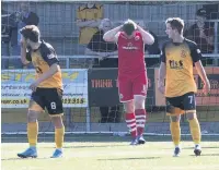  ??  ?? FRUSTRATIO­N Albion’s Mackin reacts to his missed penalty