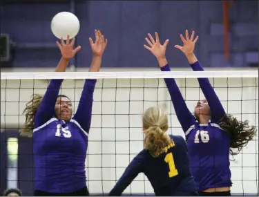  ?? PHOTOS BY MIKE BUSH/NEWS-SENTINEL ?? Above: Tokay middle blocker Nicole Segovia (15) and outside hitter Cianna Guidi go up for the block shot against Gregori's Tori Goff in Tuesday's match at The Jungle. Below: Tokay libero Grace Polhemus sets up the ball for Guidi (16) and Natalie Adams...