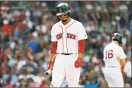  ?? Winslow Townson / Associated Press ?? Mookie Betts heads back to the dugout after striking out during the ninth inning against the Rays on Sunday.