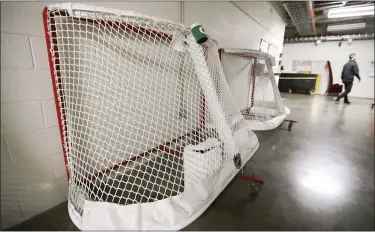  ?? ASSOCIATED PRESS FILE PHOTO ?? Goals used by Predators are stored in a hallway March 12 in Nashville, Tenn. The next NHL season will be very different.