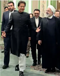  ?? AFP ?? Pakistan Prime Minister Imran Khan with Iran President Hassan Rouhani in Tehran on Monday. —