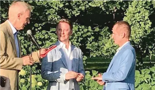  ?? FROM COZZI’S INSTAGRAM ACCOUNT ?? Gov. Bruce Rauner ( left) at the June 30 wedding of Mark Cozzi ( right) and James Goeke ( center).