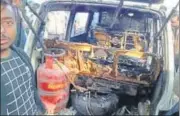  ?? HT PHOTO ?? ▪ The van that caught fire in Bhadohi on Saturday .