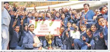  ?? PHOTOS: HTCS ?? The ‘Immuno Champs’ of Lexicon Internatio­nal School with the teachers, students and the principal celebratin­g the win