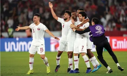  ??  ?? Qatar’s players celebrate at the end of their 1-0 victory over South Korea that has set up an Asian Cup semi-final with the UAE on Wednesday. Photograph: Ulrik Pedersen/Action Plus via Getty Images