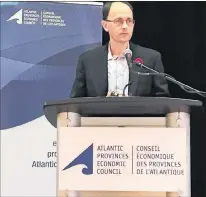  ?? SAM MCNEISH/THE TELEGRAM ?? Things are looking up for Newfoundla­nd and Labrador in 2018, according to David Chaundy, director of research for the Atlantic Provinces Economic Council, who spoke to delegates at the APEC Business Outlook Conference Tuesday at the Delta in St. John’s.