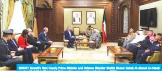  ?? — KUNA ?? KUWAIT: Kuwait’s First Deputy Prime Minister and Defense Minister Sheikh Nasser Sabah Al-Ahmad Al-Sabah meets with British Minister for Defense Procuremen­t Stuart Andrew.