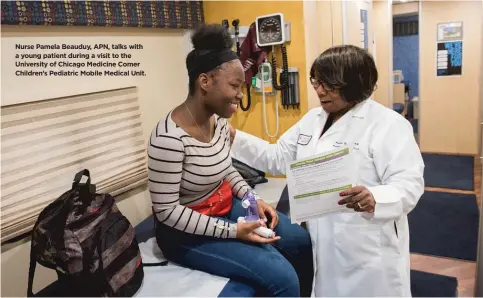  ?? Read the reports and community profiles at UChicagoMe­dicine.org/Community-Health ?? Nurse Pamela Beauduy, APN, talks with a young patient during a visit to the University of Chicago Medicine Comer Children’s Pediatric Mobile Medical Unit.