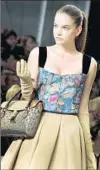  ?? Francois Durand
Getty Images ?? ITS RETRO STYLE echoed in a 2010 Louis Vuitton show.