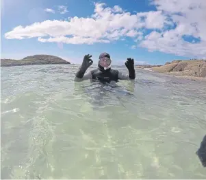  ??  ?? GOING SWIMMINGLY: Noel Hawkins on the North-West Highlands Snorkel Trail