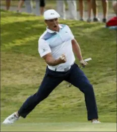  ?? JOHN LOCHER — THE ASSOCIATED PRESS ?? Bryson DeChambeau celebrates after sinking a putt for an eagle on the 16th green during the final round of the Shriners Hospitals for Children Open Sunday in Las Vegas.