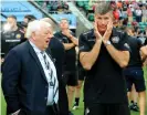  ?? Photograph: David Rogers/Getty Images ?? Rob Baxter (right), the Exeter director of rugby, and the owner, Tony Rowe, look dejected after their defeat to Saracens in the 2019 Premiershi­p final.