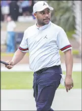  ?? Stephen B. Morton The Associated Press ?? Harold Varner III walks off the 15th green Saturday after sinking a birdie putt in the third round of the RBC Heritage at Harbour Town Golf Links.