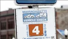  ?? NICOLAUS CZARNECKI / BOSTON HERALD ?? A vehicle inspection location displays an April 2022 sticker but drivers still aren’t able to get an inspection. The RMV said drivers with expired stickers should plan ‘to obtain inspection by the end of April.’