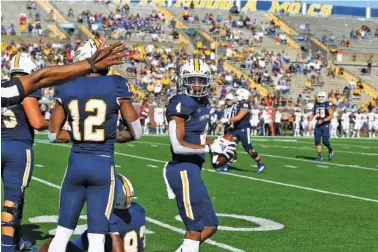  ?? UTC PHOTO BY DALE RUTEMEYER ?? Former Bradley Central standout Javon Burke, shown with the football during UTC’s game at East Tennessee State last October, hopes to be ready for a bigger role as a Mocs receiver this season.