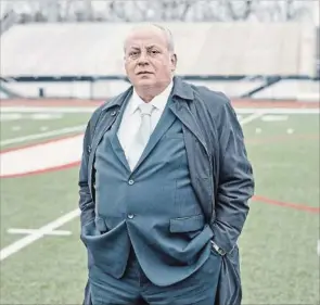  ?? ROSS MANTLE
NEW YORK TIMES ?? John Orsini at the Upper St. Clair High School football field in Pittsburgh. Orsini has gone to court to prevent the youngest of his three sons from playing high school football.