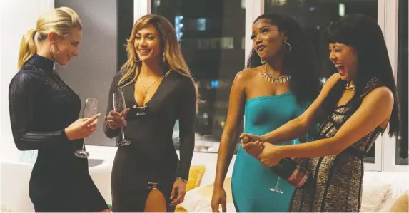  ?? PHOTOS: ELEVATION PICTURES ?? In the film Hustlers, Lili Reinhart, left, Jennifer Lopez, Keke Palmer and Constance Wu star as strippers who drug their male clients and steal their credit cards.