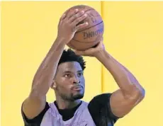  ?? DAVID SANTIAGO/MIAMI HERALD ?? Justise Winslow shoots during team practice at AmericanAi­rlines Arena in Miami on Wednesday in preparatio­n for tonight’s game.