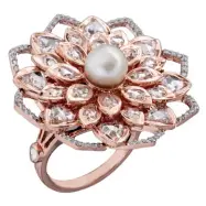  ??  ?? C. Krishniah Chetty & Sons The taamrasa ring infuses the traditiona­l lotus with modern design in 18-carat rose, yellow and white gold.