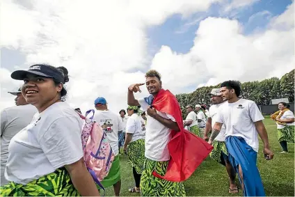  ?? PHOTOS: BRADEN FASTIER/STUFF ?? Members of the Samoan community gather at Saxton Fields to play in the inaugural kirikiti tournament. Teams from Motueka, Nelson, Stoke and Richmond took part, and it is hoped more will follow.