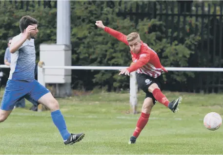  ??  ?? Silksworth CW (red and white) attack against Harton and Westoe in last week’s opening win.