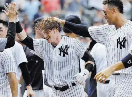  ?? Julio Cortez ?? The Associated Press The Yankees’ Clint Frazier is batting .292 (7 for 24) with six extra-base hits, including three homers, since being called up July 1 following a rash of injuries.