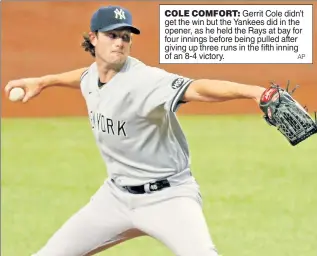  ?? AP ?? COLE COMFORT: Gerrit Cole didn’t get the win but the Yankees did in the opener, as he held the Rays at bay for four innings before being pulled after giving up three runs in the fifth inning of an 8-4 victory.