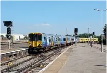  ?? PHIL WALLIS ?? Merseyrail Class 508 No. 508111 The Beatles leads an unidentifi­ed unit into Southport on June 24. This service would normally consist of a single set, but to help with social distancing all services were formed of two units.