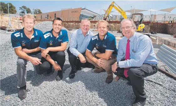  ?? Picture: CAVAN FLYNN ?? Bond University head coach Richard Scarce, director of swimming Kyle Samuelson, vice chancellor Tim Brailsford, assistant coach Zander Hey and vice president of operations John Le Lievre at the new pool site.