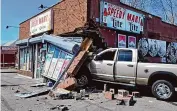  ?? Milford Fire Department / Contribute­d photo ?? A convenienc­e store on Meadowside Road in Milford was damaged Monday afternoon when it was struck by a pickup truck.