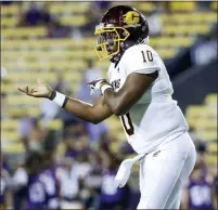  ??  ?? Central Michigan quarterbac­k Daniel Richardson reacts after throwing a touchdown pass against LSU in Saturday’s loss.