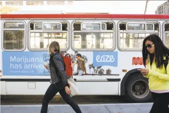  ?? Michael Short / Special to The Chronicle ?? A Muni bus ad promotes the marijuana delivery service Eaze. The Municipal Transporta­tion Agency is banning ads from cannabis-related businesses when the current contracts expire.