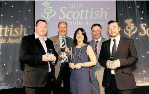  ??  ?? WINNERS: From left, Des Cheyne, of The Famous Spotty Bag Shop; Roger Goodyear, from the Scottish Traditiona­l Boat Festival; Kirstin Gove; Ken Massie, and Alastair Fenn, of Deveron, Bogie and Isla Rivers Charitable Trust. Photograph: Kenny Elrick