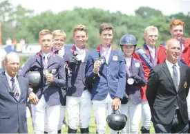  ??  ?? Junior silver medallists Jack Whitaker, Olli Fletcher, Robert Murphy and Sienna Charles are joined by fifth team rider Jack Winter