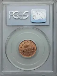  ?? HERITAGE AUCTIONS ?? The 1936 ‘dot cent,’ with a distinctiv­e dimple below the date, is one of only three known to have been produced.