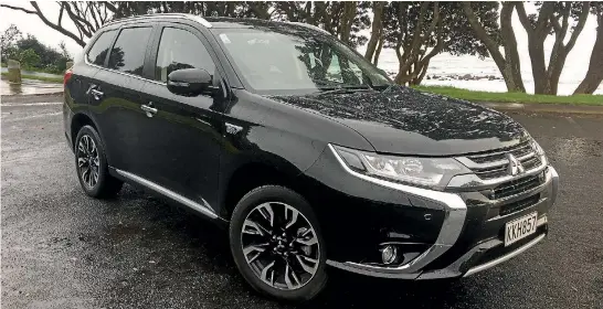  ?? ROB MAETZIG/STUFF ?? The Mitsubishi Outlander PHEV, New Zealand’s most popular electrifie­d vehicle.