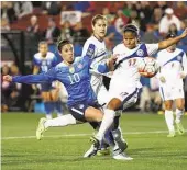  ?? Jae S. Lee / Dallas Morning News ?? After brushing aside Puerto Rico in group play, Carli Lloyd, left, and her U.S. teammates test Trinidad and Tobago in tonight’s semifinals.