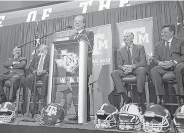  ?? Mark Mulligan / Houston Chronicle ?? Jimbo Fisher’s folksy manner played well Monday during his introducto­ry news conference at Kyle Field.