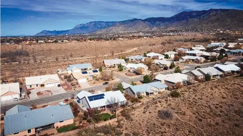  ?? COURTESY OF SOLAR WORKS ENERGY ?? Solar panels installed by Solar Works Energy top a home in Southeast Albuquerqu­e.