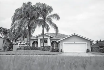  ?? [ALEX DRIEHAUS/NAPLES DAILY NEWS] ?? This is the home owned by Ohio House Speaker Larry Householde­r in Naples, Fla. Records show he’s been delinquent in paying taxes on the house and at times failed to keep it in good shape.