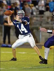  ?? AJC FILE PHOTO 2004 ?? Graham, shown playing for Norcross High School in 2004, injured his left knee and sustained concussion­s playing football. His injuries led him to painkiller­s, and an addiction escalated terribly in a few years.